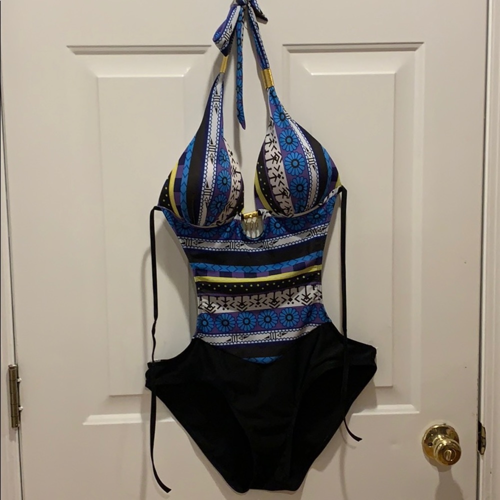 One piece open back and open side bathing suit